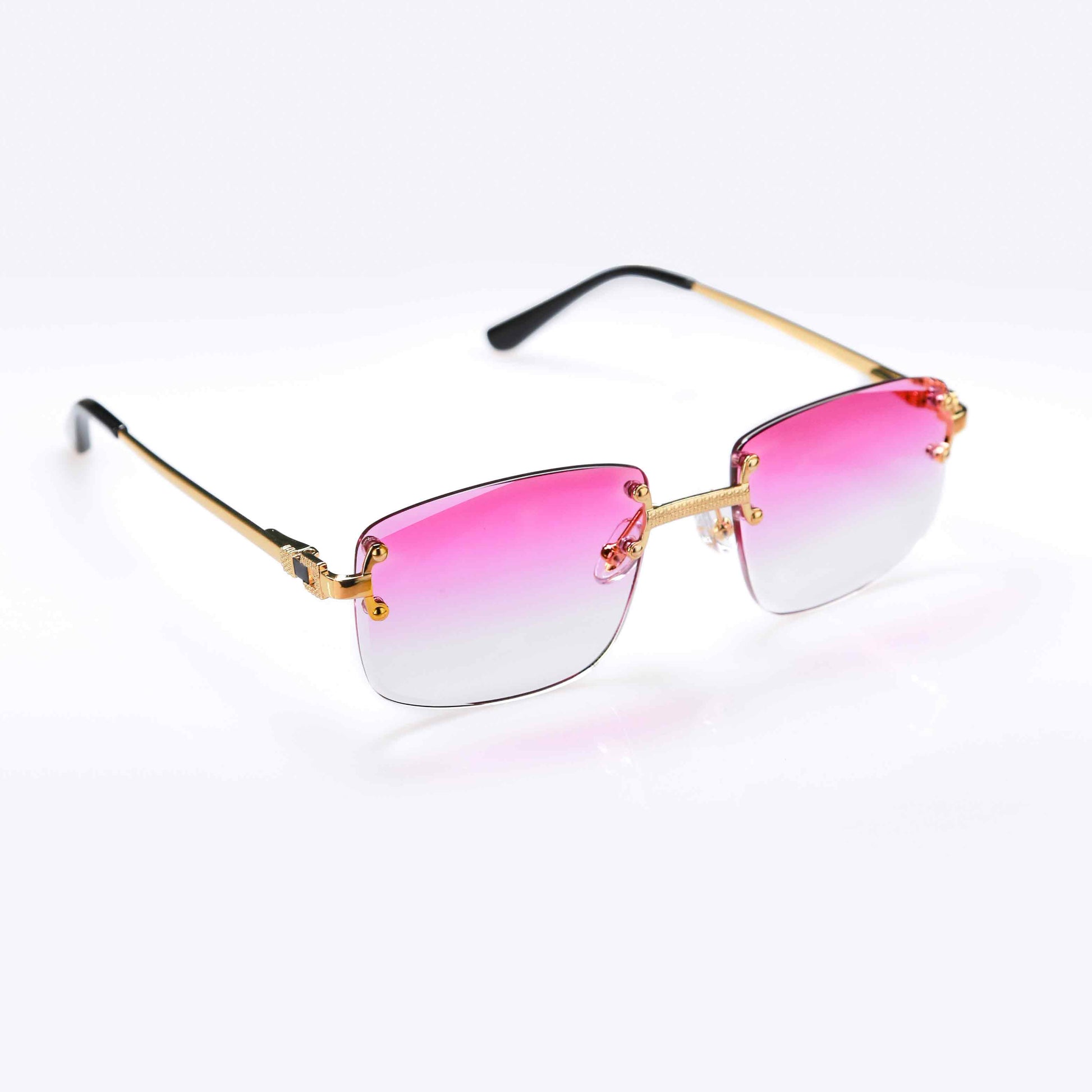 Lunettes de soleil Shine avec verres roses dégradés et monture dorée. Parfaites pour un look tendance et une protection UV stylée.
