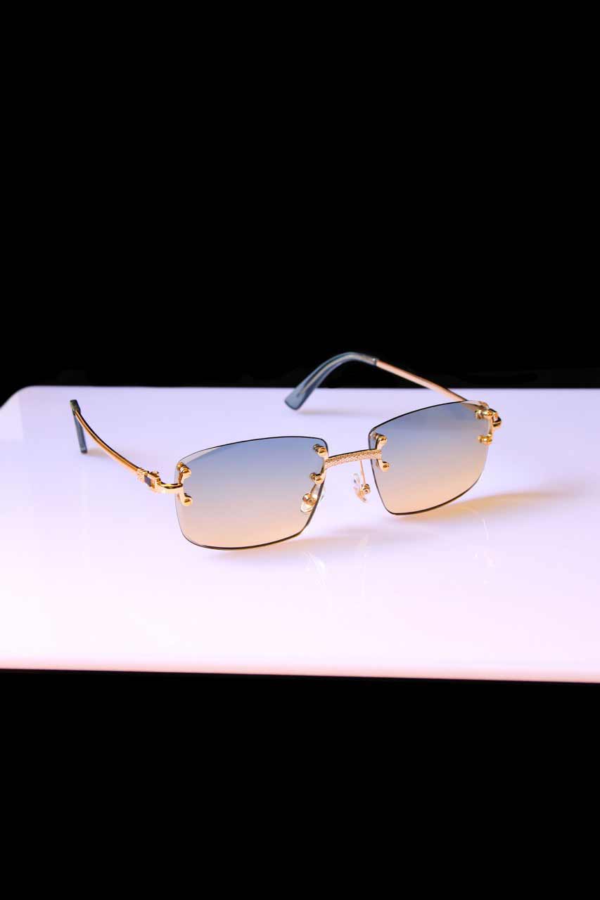 Lunettes de soleil Shine à verres dégradés beige et monture dorée. Accessoire chic pour homme avec protection UV de qualité.
